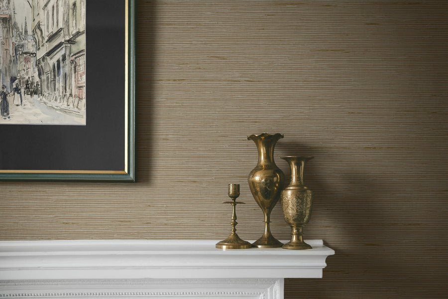 Decorative vases on a white mantelpiece against a textured brown wall with a framed picture.