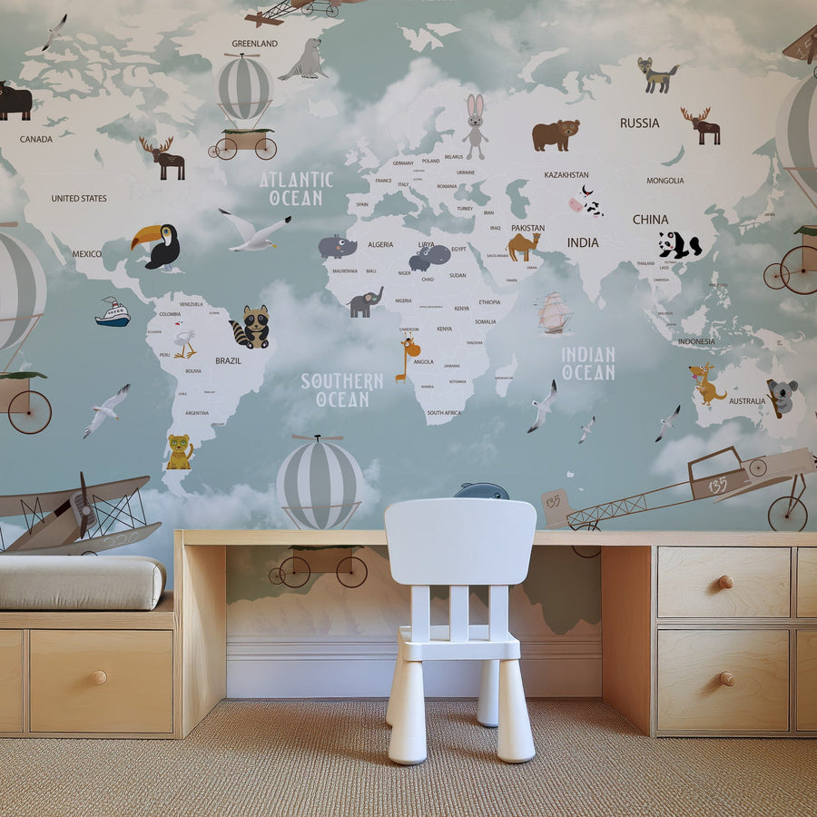 Children's room with educational world map wallpaper, desk, and chair.