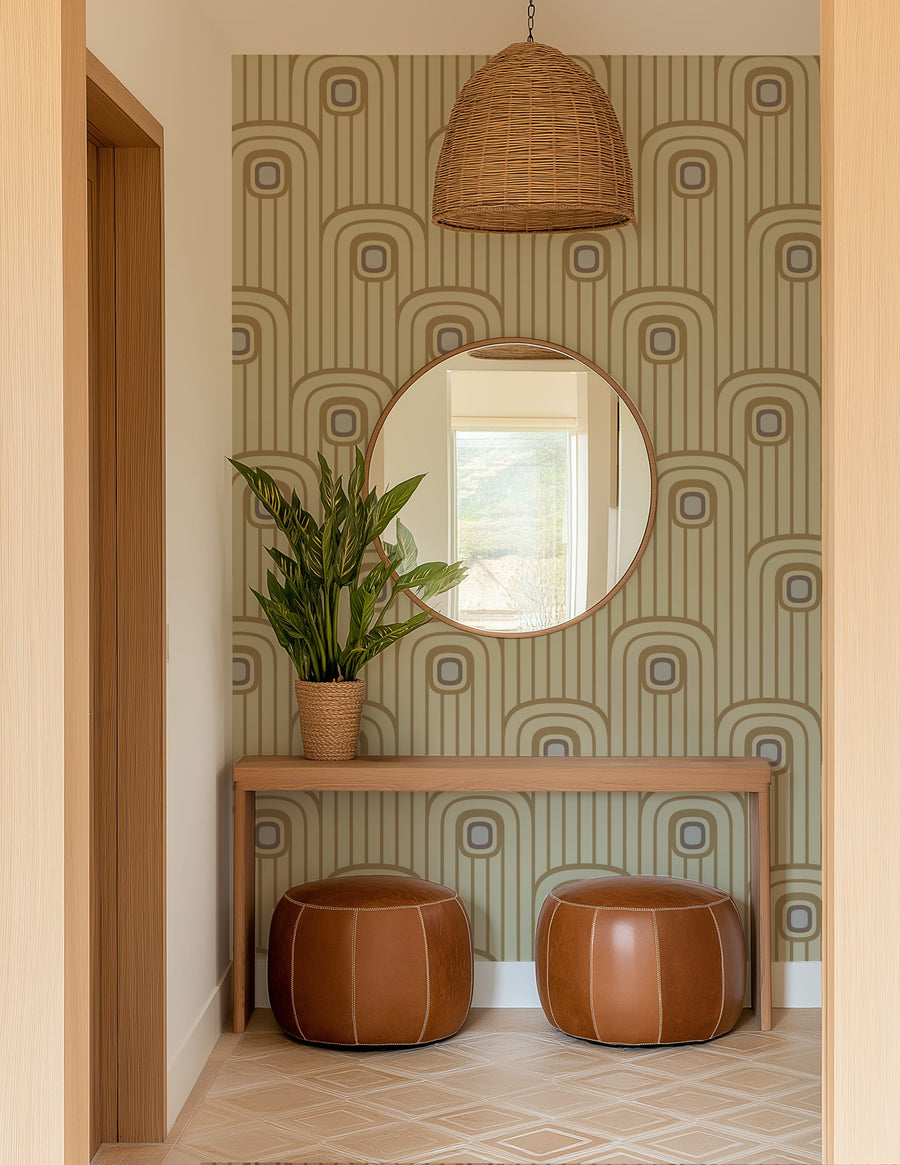Foyer with round mirror, plant, and leather stools against Warm Beige 70s Retro Mod Arch Geometric Wallpaper