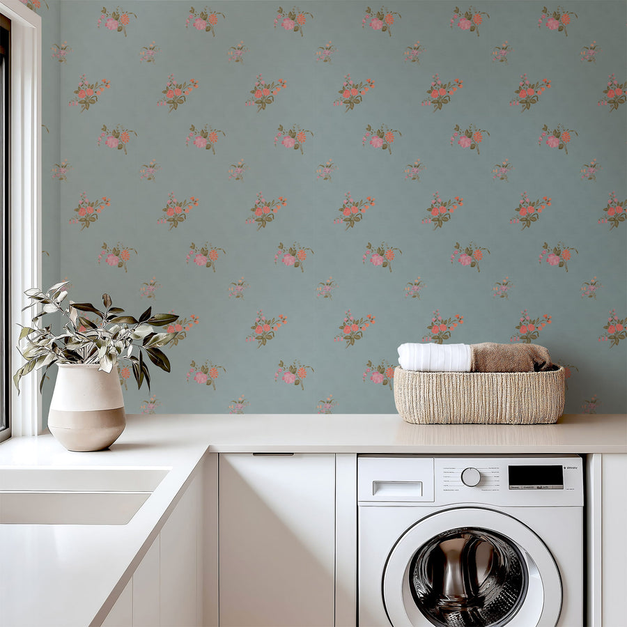 Laundry room with Vintage Heirloom Floral Bouquet Wallpaper in Blue, washing machine, and basket.
