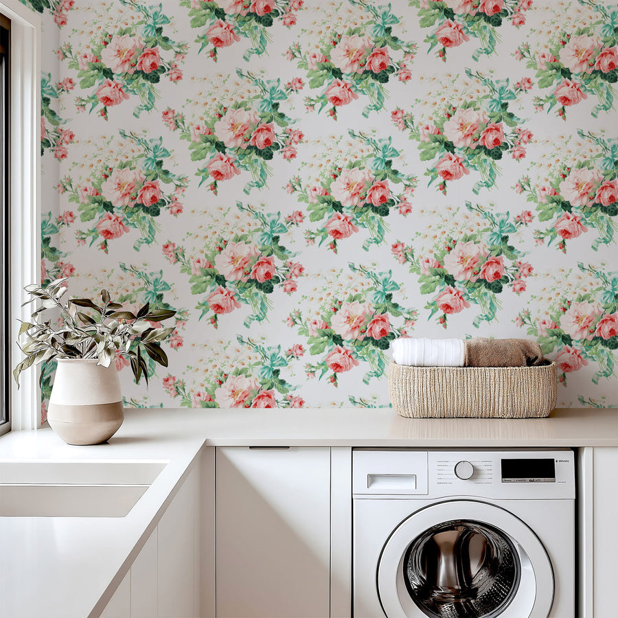 Laundry room with Vintage Rose Bouquet Wallpaper washing machine, and decorative elements.