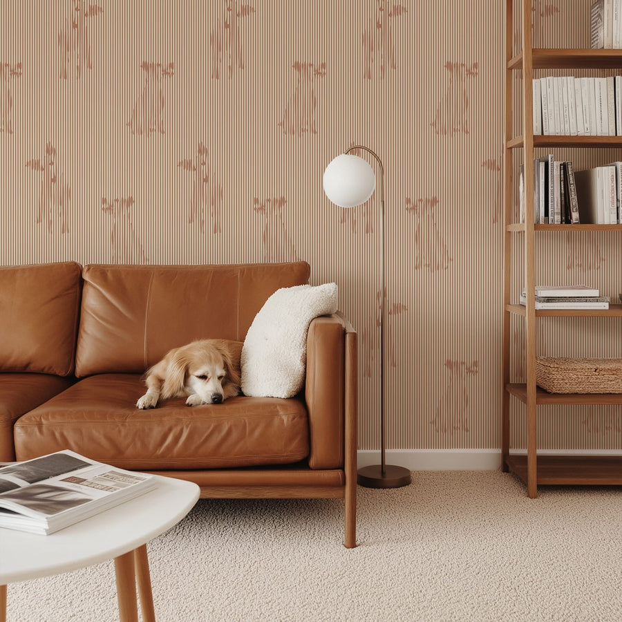 Living room with a brown leather sofa, a dog, a lamp, and a bookshelf with Terracotta Stripe with Dog Silhouette Wallpaper
