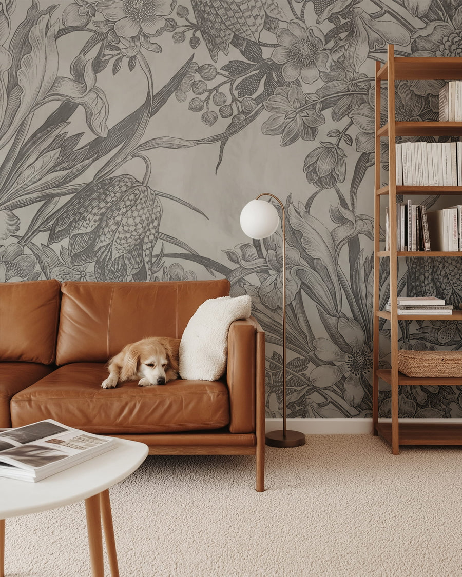 Living room with brown leather sofa, dog, and Vintage Etched Tulip & Narcissus Floral Wall Mural