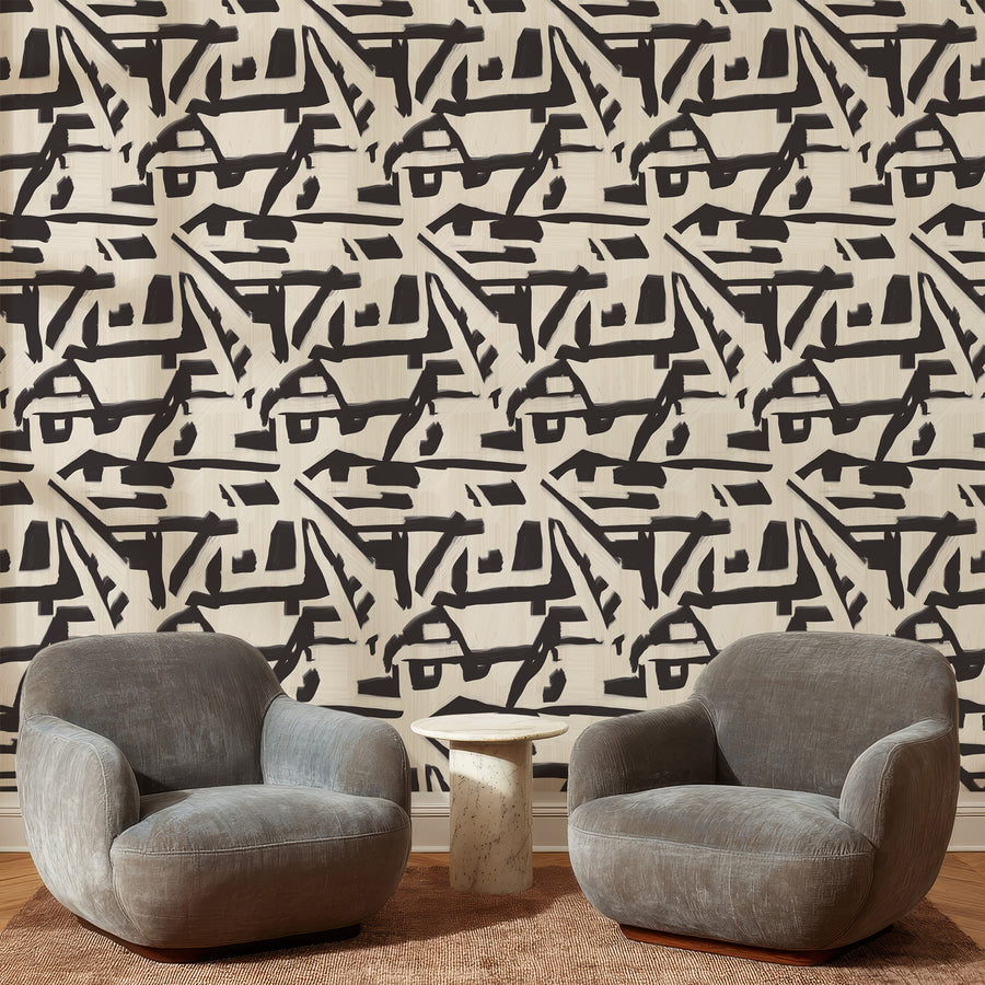 Two gray armchairs in front of a wall with Abstract Brushstroke Wallpaper Cream Black