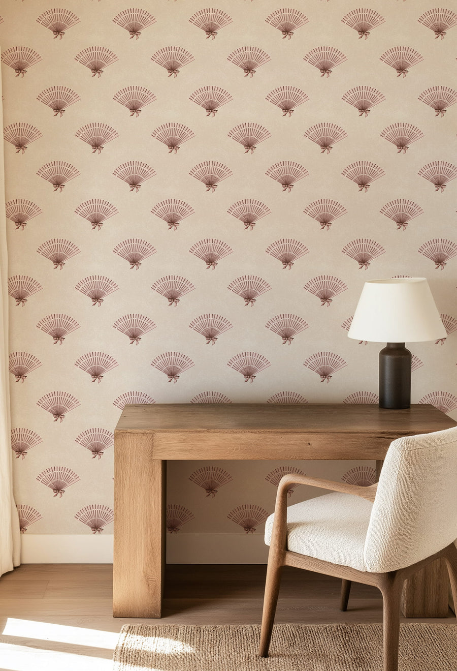 Wooden desk with a chair against a wall with Neutral Pink Preppy Coquette Bow Fan Wallpaper