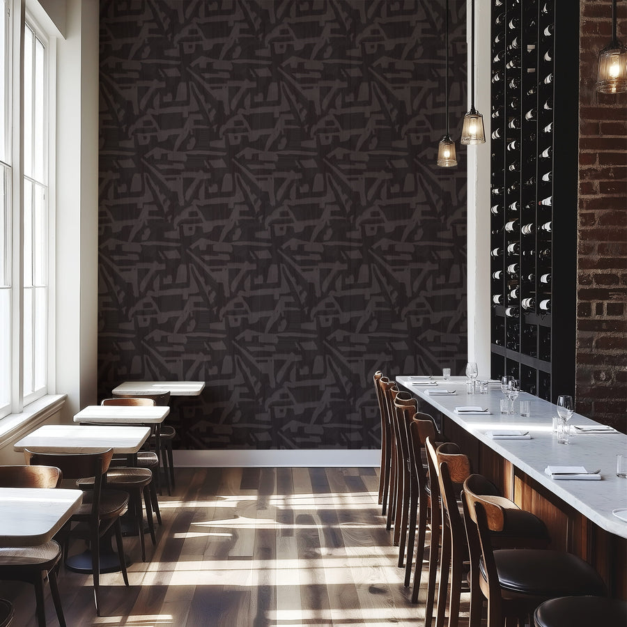 Restaurant with banquette and bar seating featuring Abstract Brushstroke Wallpaper Charcoal Grey accent wall