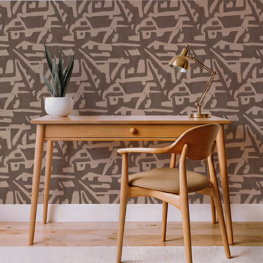 Dining area with wood table and chairs featuring Abstract Brushstroke Wallpaper Taupe Brown accent wall