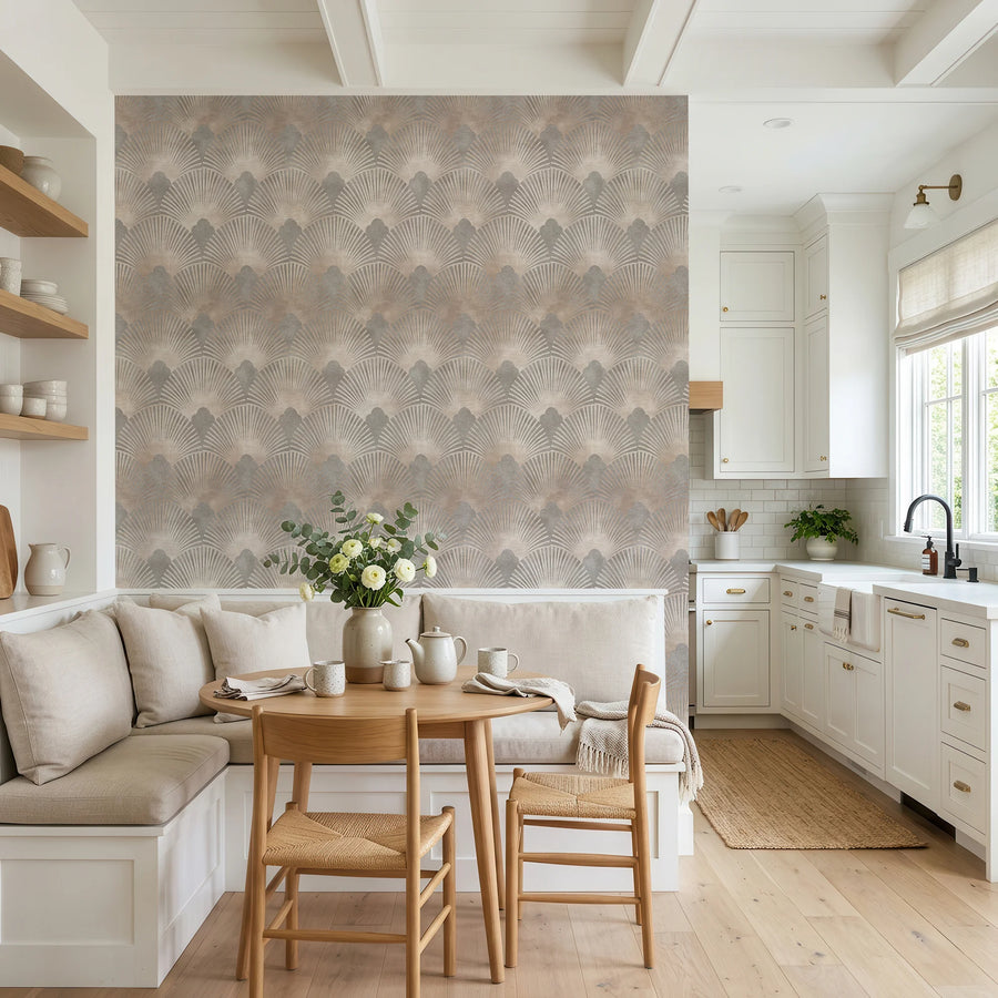 Beige and gray Art Deco scallop wallpaper in a kitchen breakfast nook with a banquette and wood table
