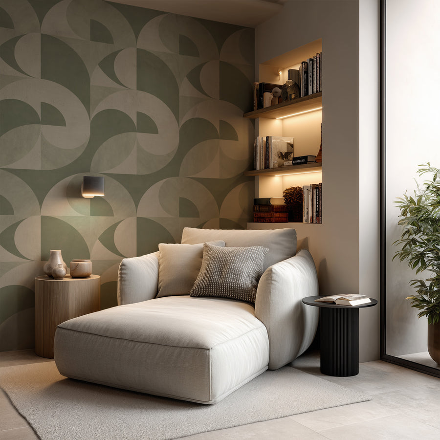 Living room reading nook with cream sofa and built-in shelves featuring Bauhaus Geometric Shapes Wallpaper Sage Green Cream accent wall