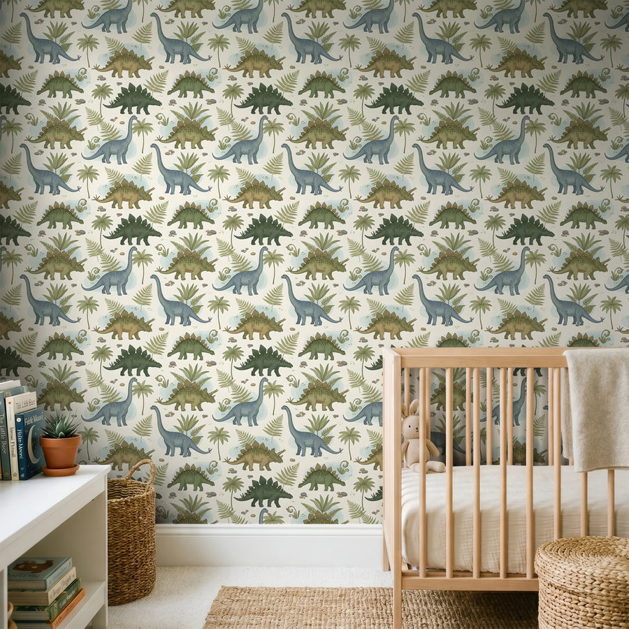 Dinosaur and fern wallpaper in sage and cream behind a wooden crib and low white shelf
