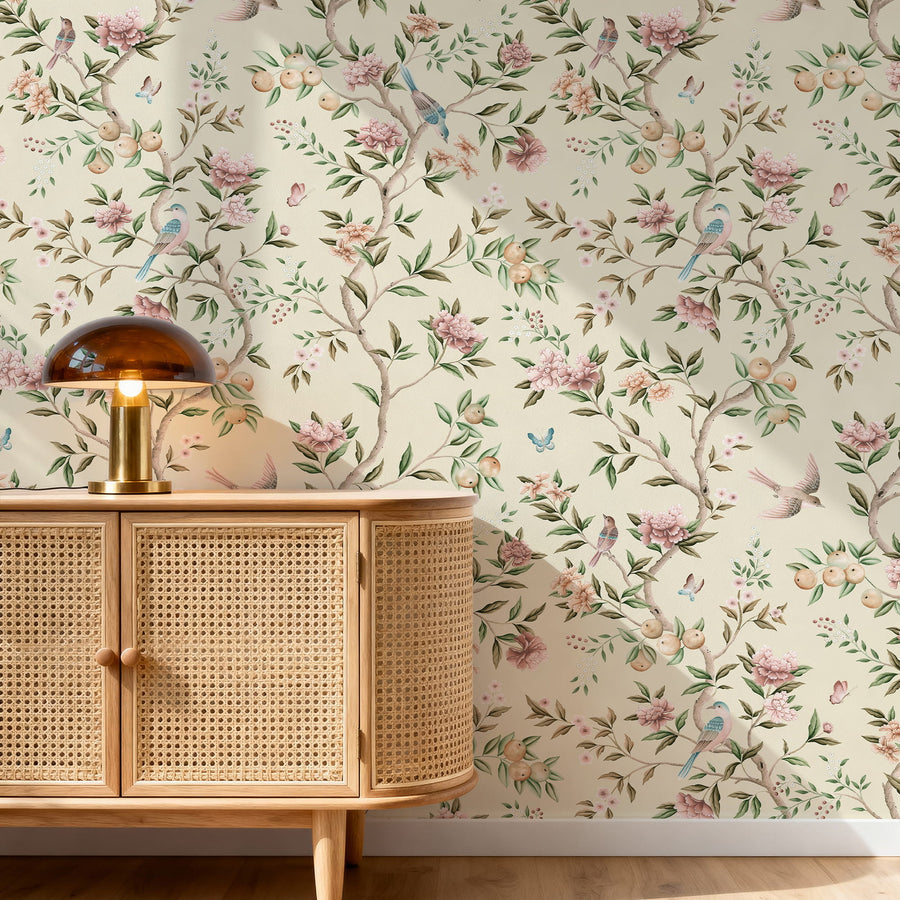 Entryway with rattan cane sideboard and brass mushroom lamp featuring Chinoiserie Floral Garden Bird Wallpaper Blush Cream by Maja Pitschmann
