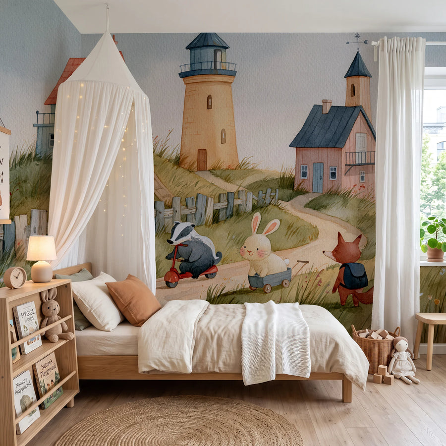 Seaside lighthouse and animals wall mural behind a canopy bed in a child's bedroom