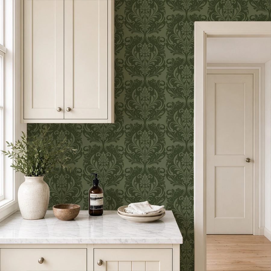 Green farmhouse damask wallpaper in a kitchen with white cabinets and marble counter