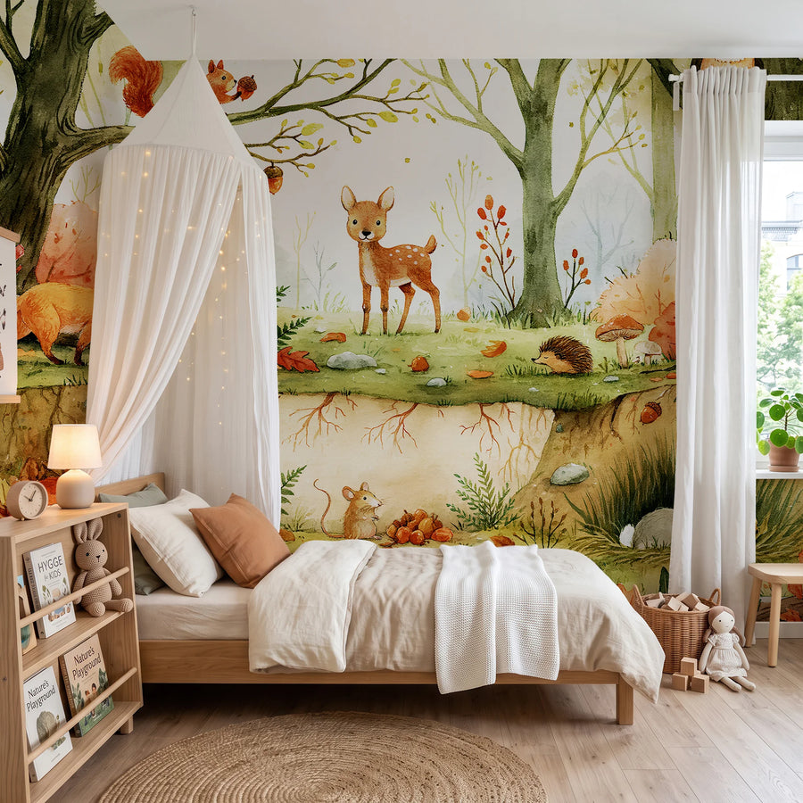 Forest animals wall mural for kids by Uta Naumann with a fox, fawn and hedgehog behind a canopy bed and bookshelf