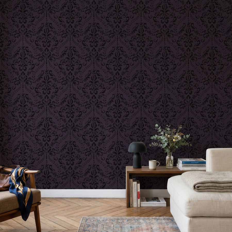 Gothic purple damask wallpaper in a sitting room with neutral furniture