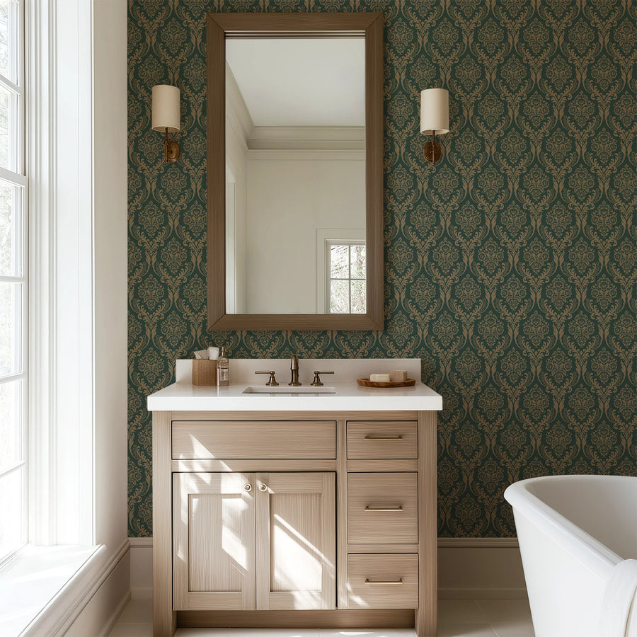 Green damask wallpaper in a bathroom with a wood vanity and mirror