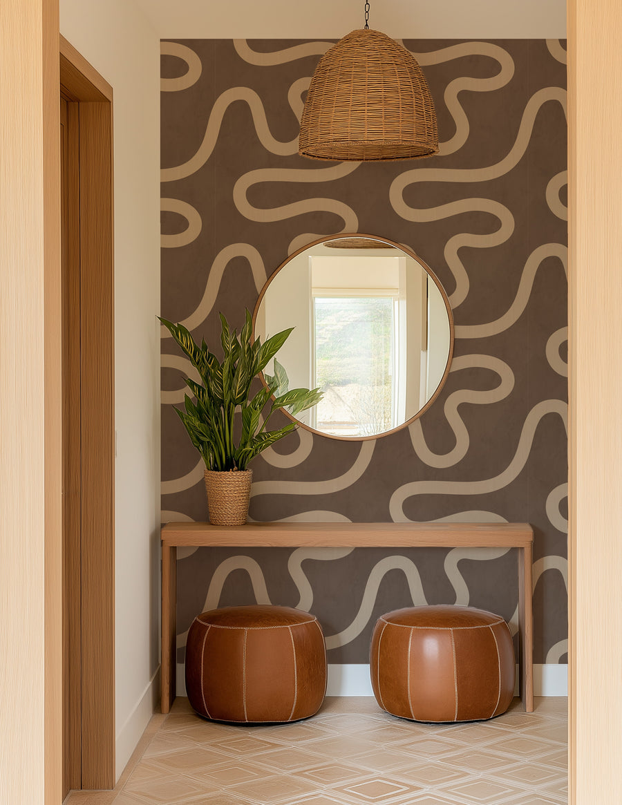 Close-up detail of Organic Flowing Line Wallpaper showing sand meandering line on warm brown textured ground