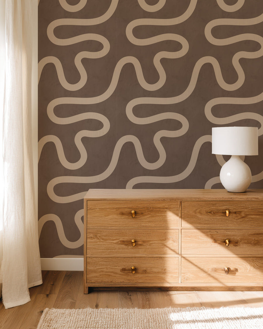 Stylish interior with Organic Flowing Line Wallpaper Sand Brown accent wall