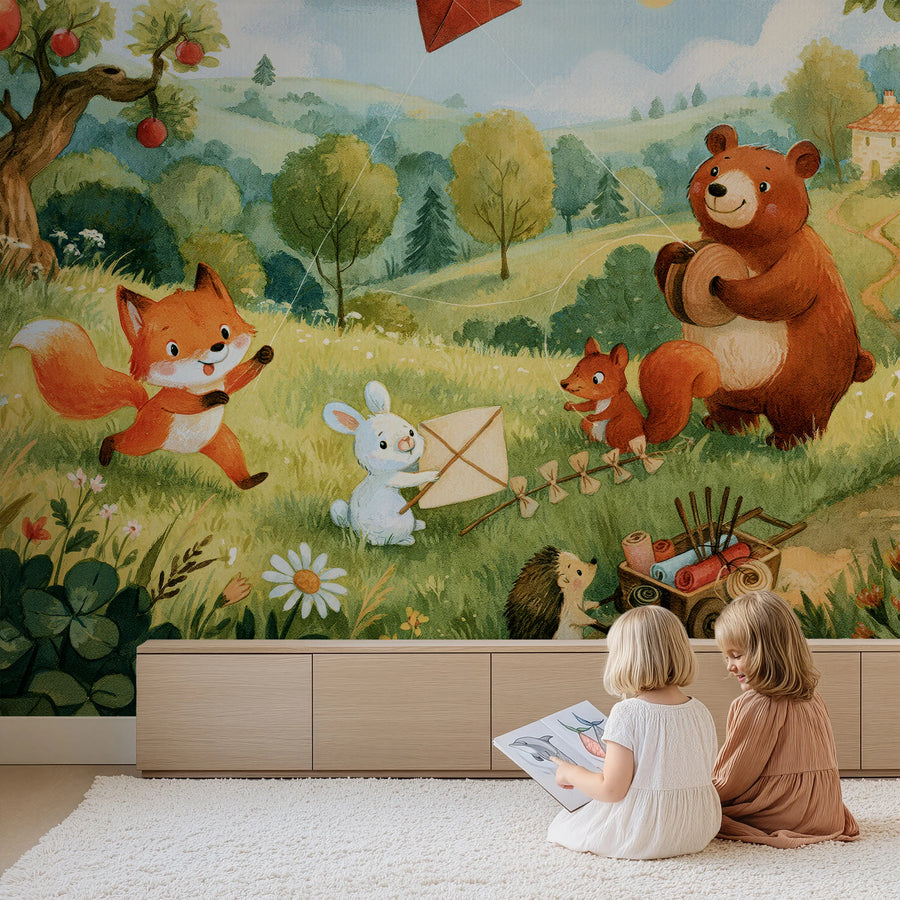 Woodland nursery mural with apple trees, a red kite and a bear behind two children reading