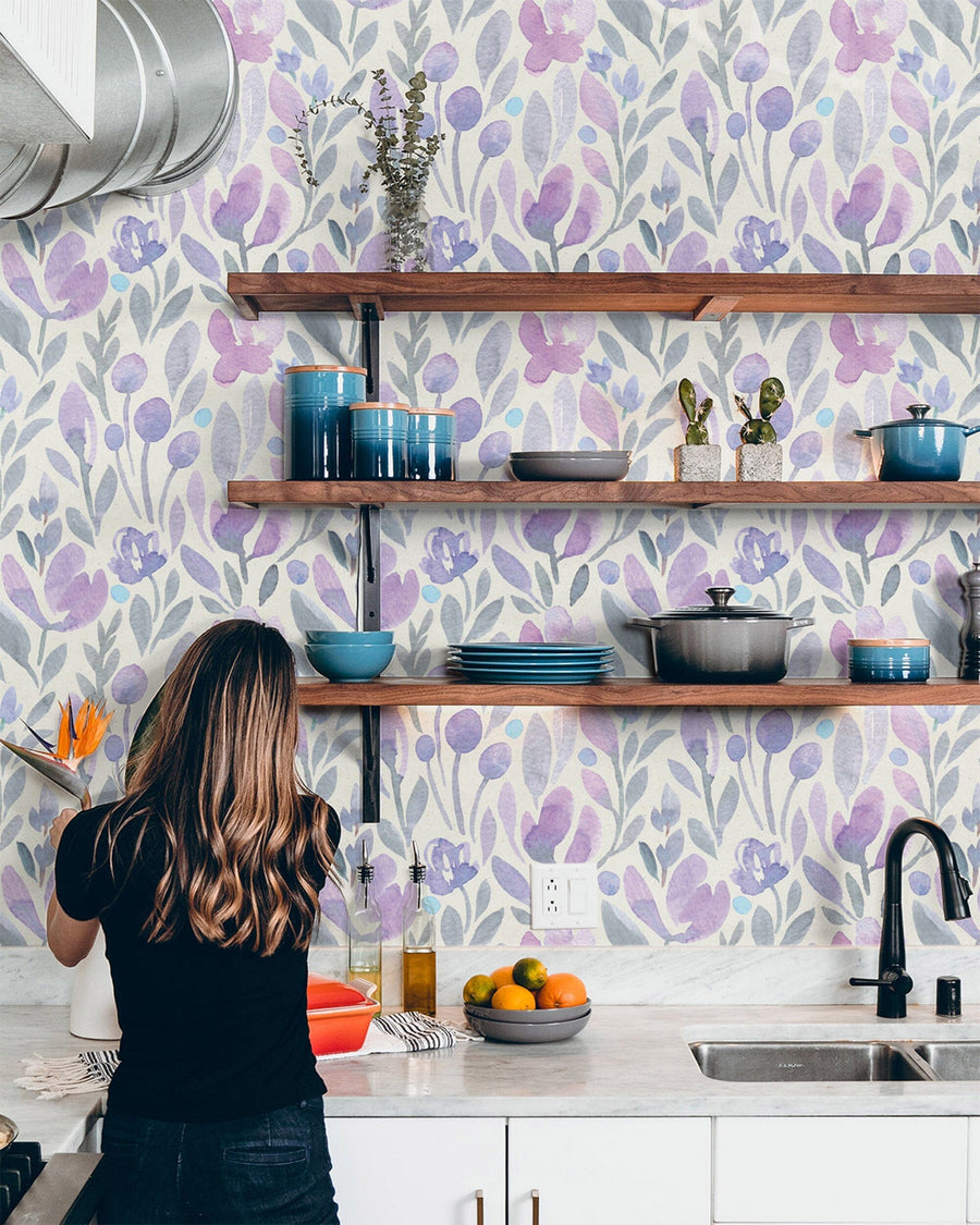 Modern kitchen with young lady and Purple Botanical Watercolor Floral Wallpaper