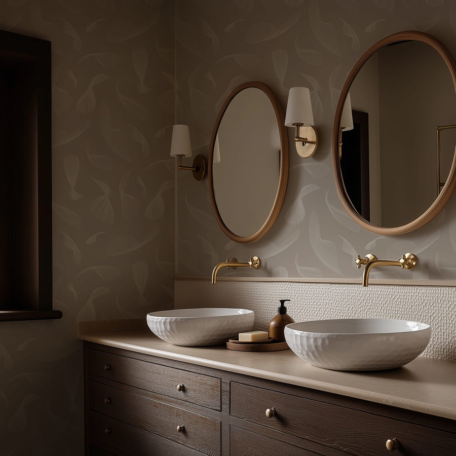 Bathroom vanity with two round sinks, mirrors, and Quill Whispers Wallpaper – Warm Taupe
