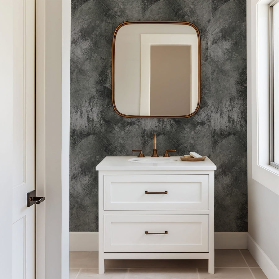 Bathroom vanity with white cabinet, marble countertop, and square mirror against a Dark Grey Grunge Concrete Wallpaper