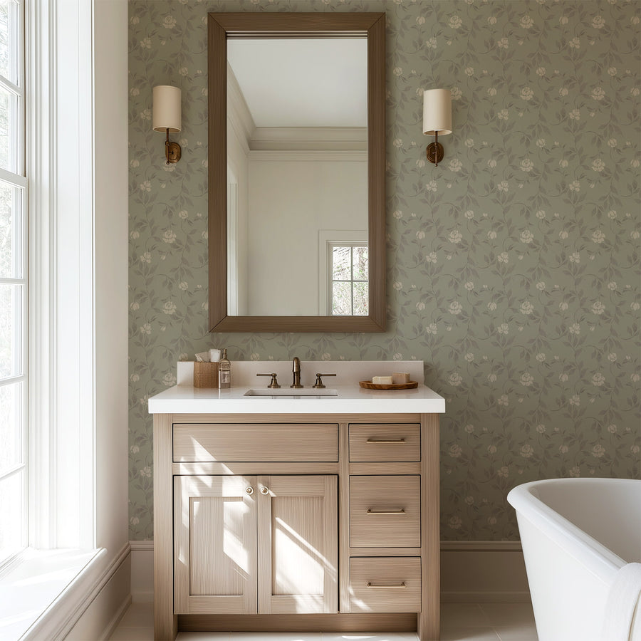 Bathroom with Blythe wallpaper in sage green featuring a trailing floral vine pattern in soft cream and taupe