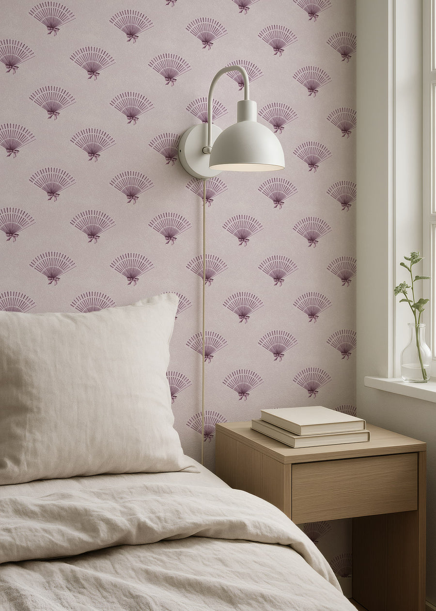 Bedroom with Light Pink Coquette Preppy Bow Fan Wallpaper bedside table, and lamp.