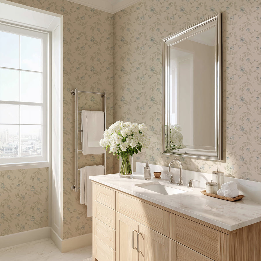 Blythe wallpaper in cream and blue featuring a trailing floral vine pattern with sky blue flowers