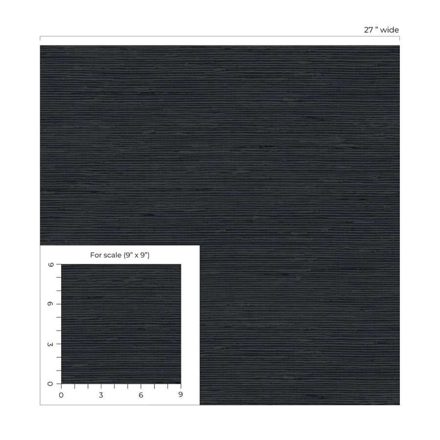 Black textured paper with a scale for reference on a white background