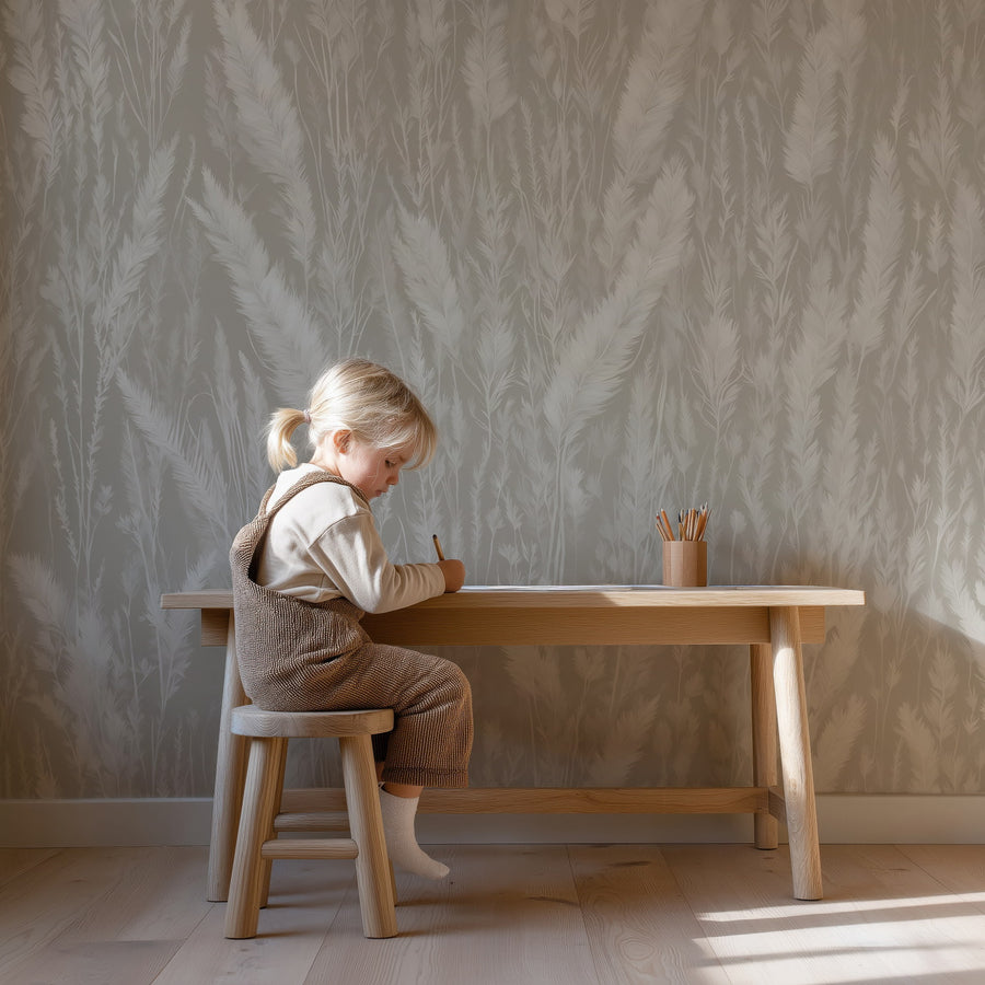 Child sitting at a wooden table with a Niche with a Japandi Soft Neutral Grass Wallpaper Mural
