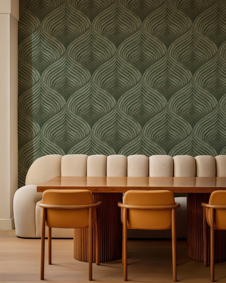 Dining area with a Abstract Petals Wallpaper - Green Art Deco Blockprint wooden table, and orange chairs.