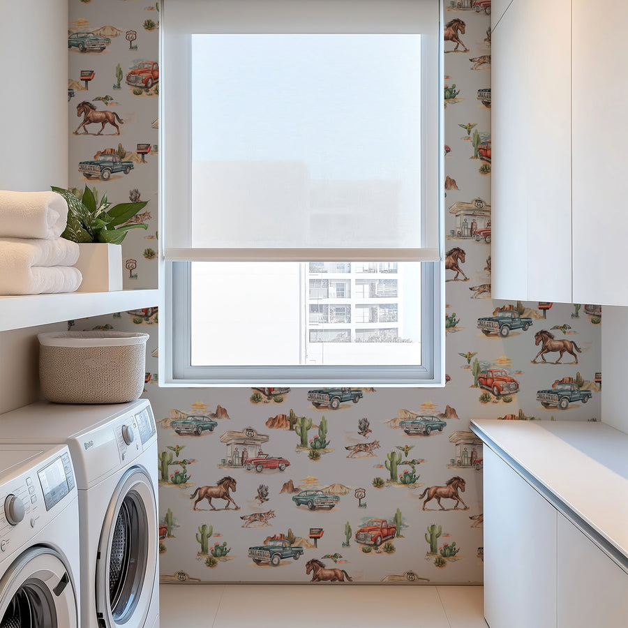 Laundry room with washing machine, shelves, and Blue Western cowboy-themed wallpaper