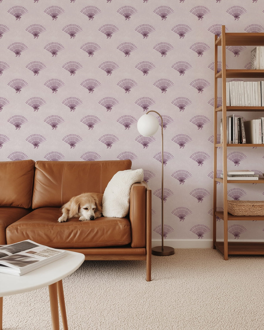 Living room with brown leather sofa, dog, and a Light Pink Coquette Preppy Bow Fan Wallpaper