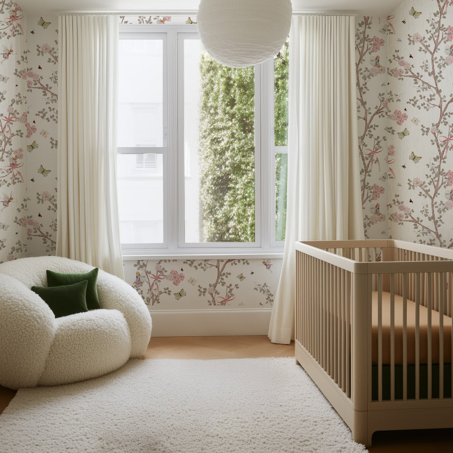 Nursery room with Fairy Garden Wallpaper – Pink Floral Branches & Butterflies crib, and window