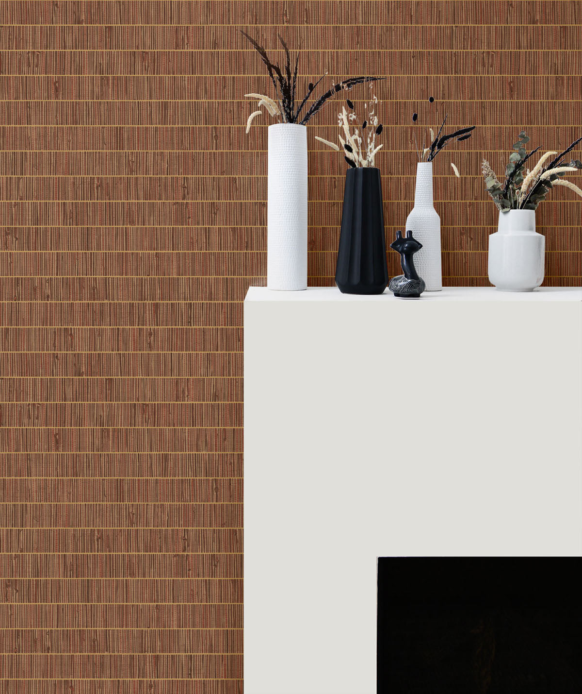 Decorative vases on a white pedestal against a wooden wall.