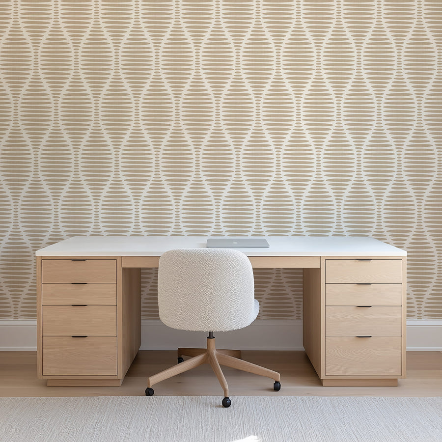 Wooden desk with a chair against Ogee Sketchy Ovals Wallpaper - Brown & Cream, bed, and window with plant