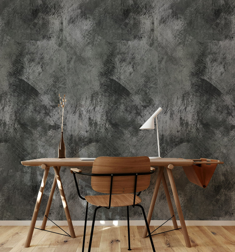 Wooden desk with chair against a Dark Grey Grunge Concrete Wallpaper