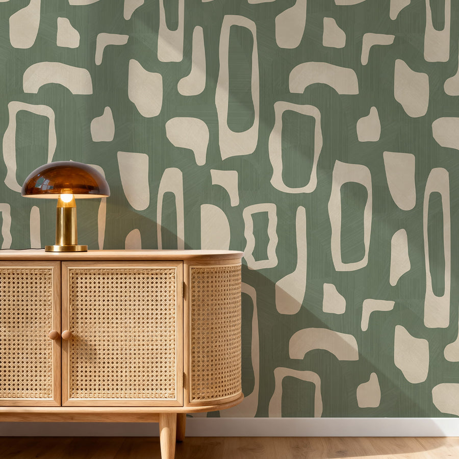 Entryway with rattan cane sideboard and brass mushroom lamp featuring Abstract Organic Shapes Wallpaper Sage Green Beige by Petra Kohlmayr