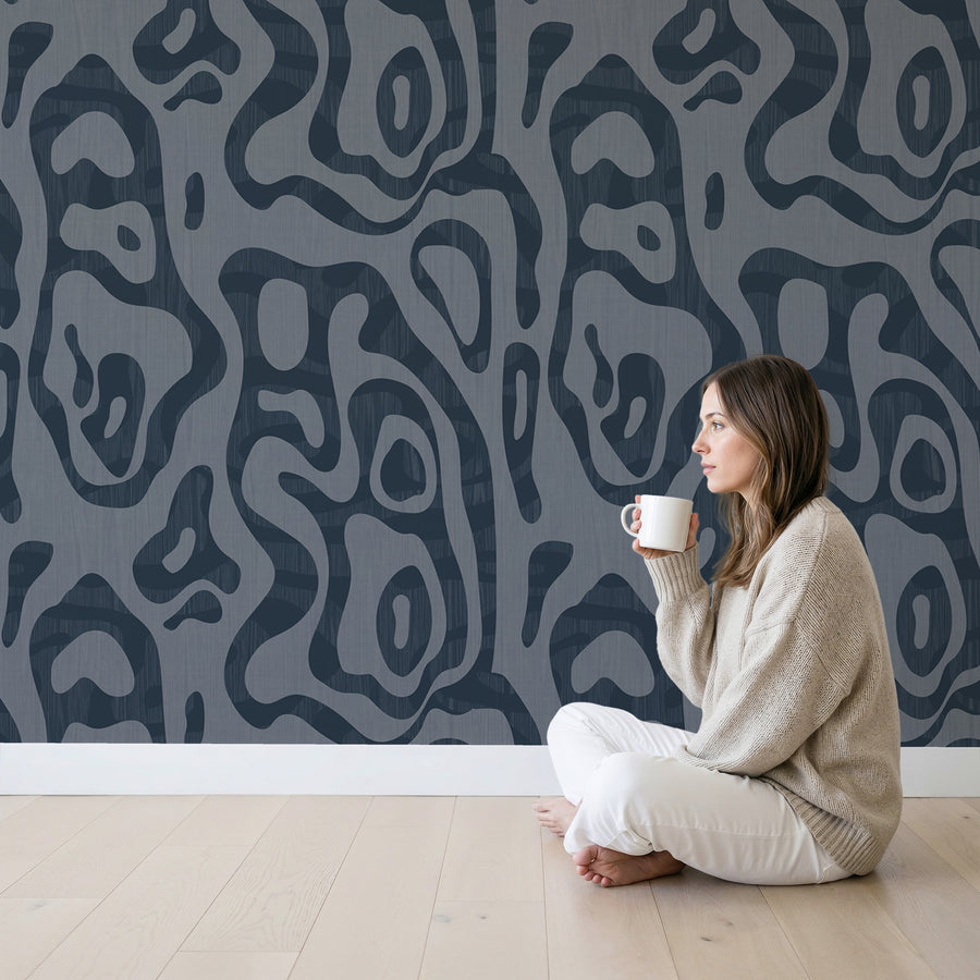 Modern living room with Abstract Topography Wallpaper Charcoal Slate Grey Organic Contour by Petra Kohlmayr