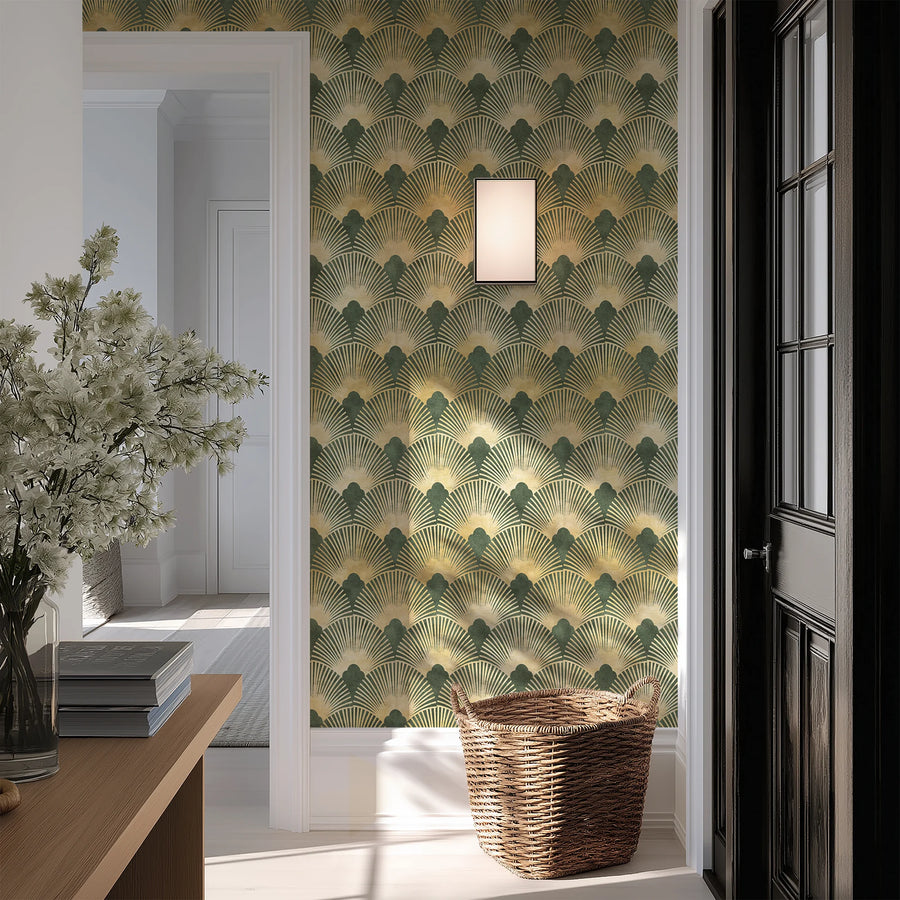 Green and gold Art Deco scallop wallpaper in an entryway with a wall sconce and woven basket