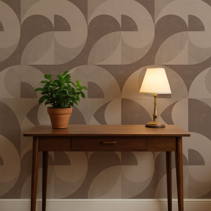 Side table with potted plant and table lamp featuring Bauhaus Geometric Shapes Wallpaper Brown Tan accent wall