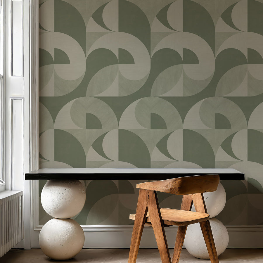 Dining area with raw wood table and ceramics featuring Bauhaus Geometric Shapes Wallpaper Sage Green Cream accent wall