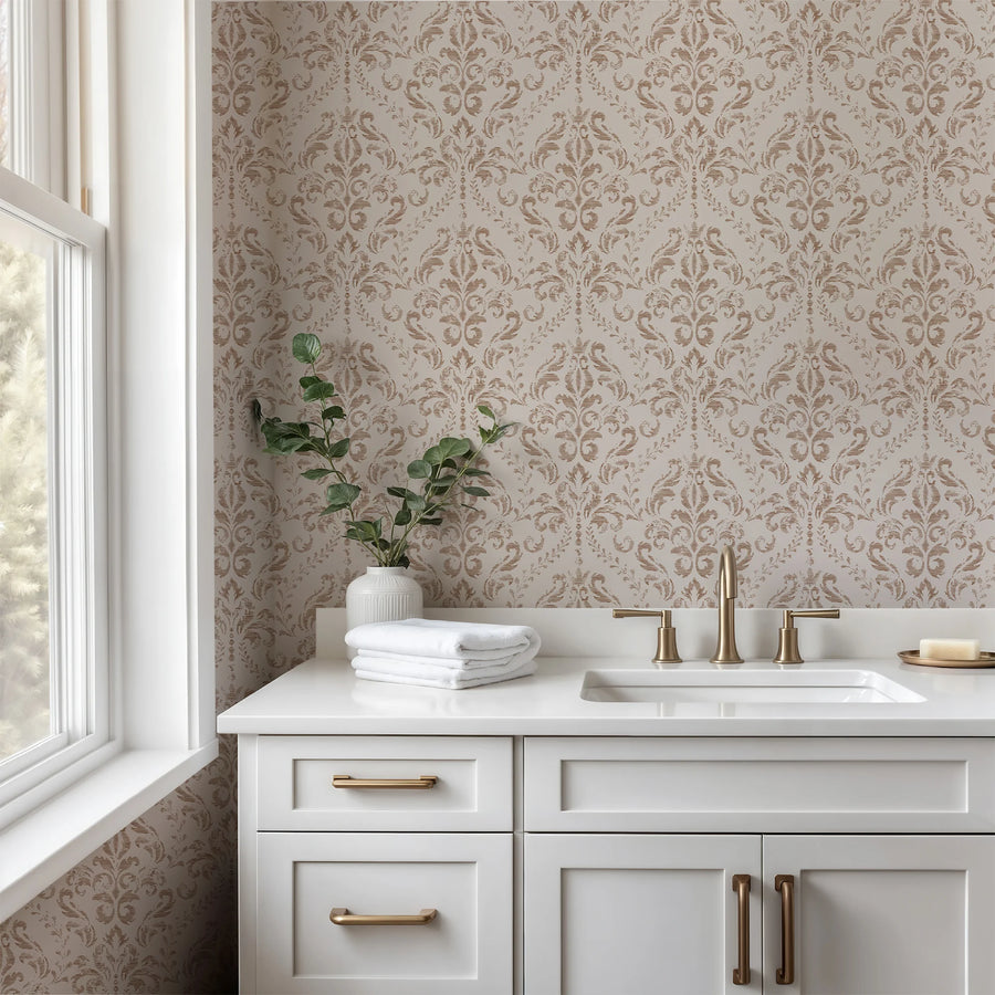 Beige distressed damask wallpaper in a bathroom with a wood vanity