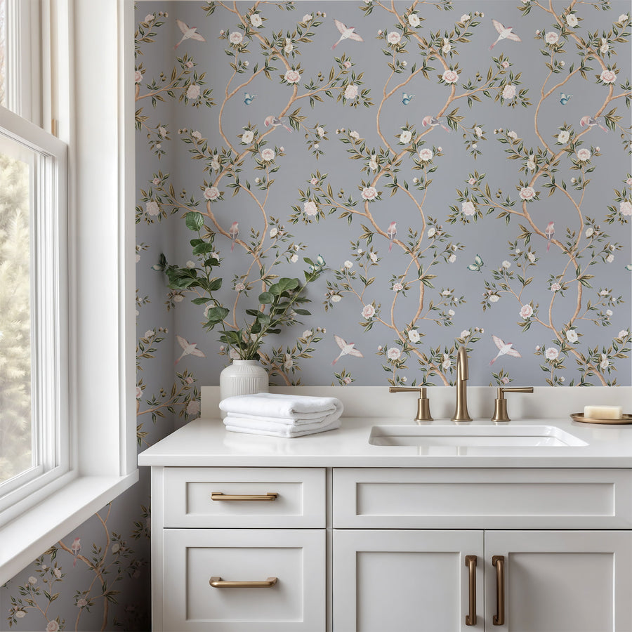 Bathroom with vanity and window featuring Blue Chinoiserie Hemma Wallpaper Floral Garden Birds accent wall