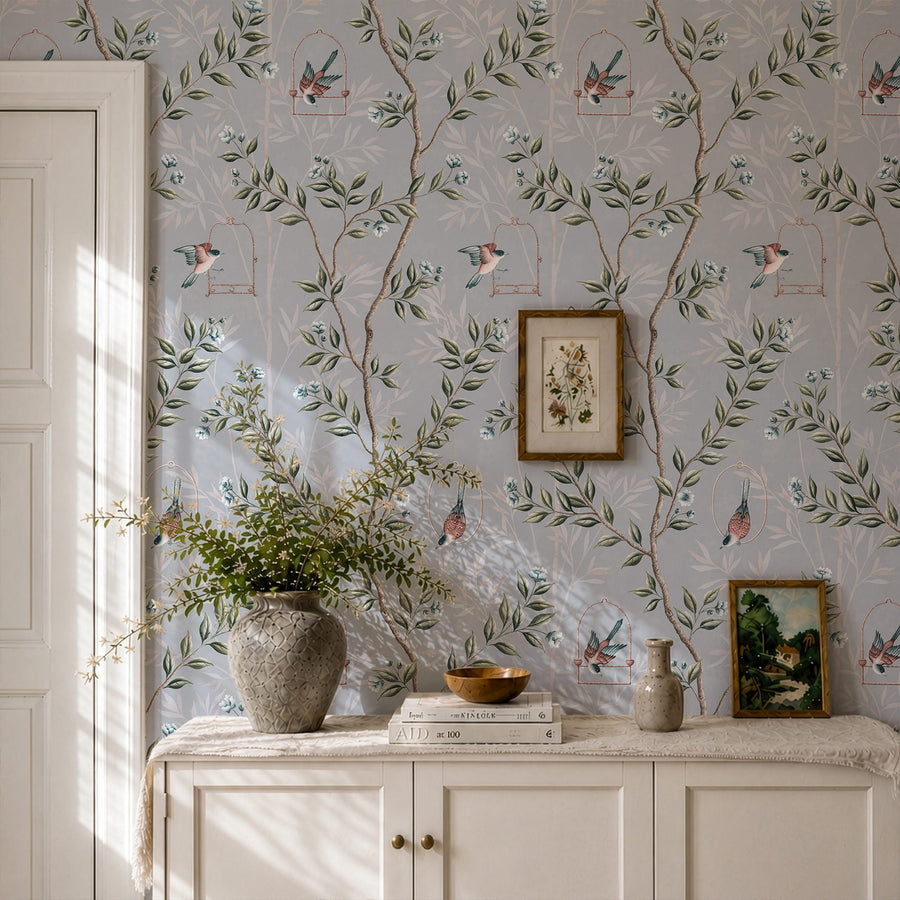 Powder room with vanity framed art and vase featuring Blue Chinoiserie Pauline Wallpaper Birds Branches accent wall