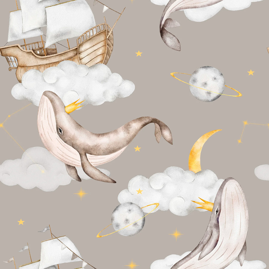 Celestial whale wallpaper pattern with crowned watercolor whales, clouds, a sailing ship, ringed planets and a gold moon on taupe