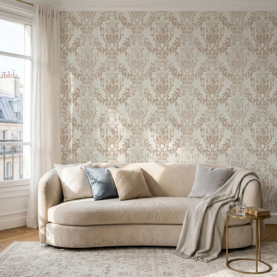 Cream beige and brown rococo damask wallpaper in a living room with a curved sofa