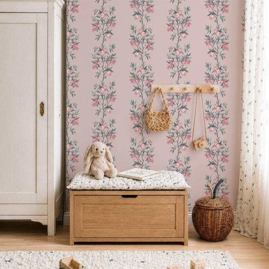 Nursery with cream storage bench wall hooks and stuffed bunny featuring Elodie Pomegranate Chinoiserie Wallpaper Pink Sage by Maja Pitschmann