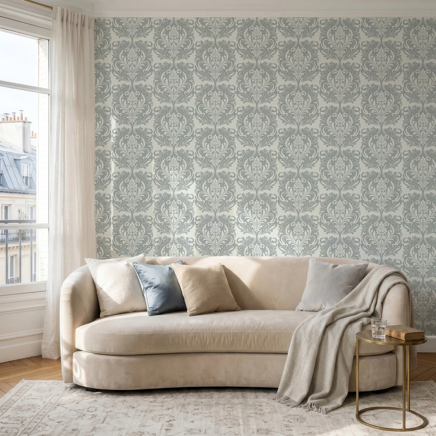 Imperial grey damask wallpaper in a living room with a neutral sofa